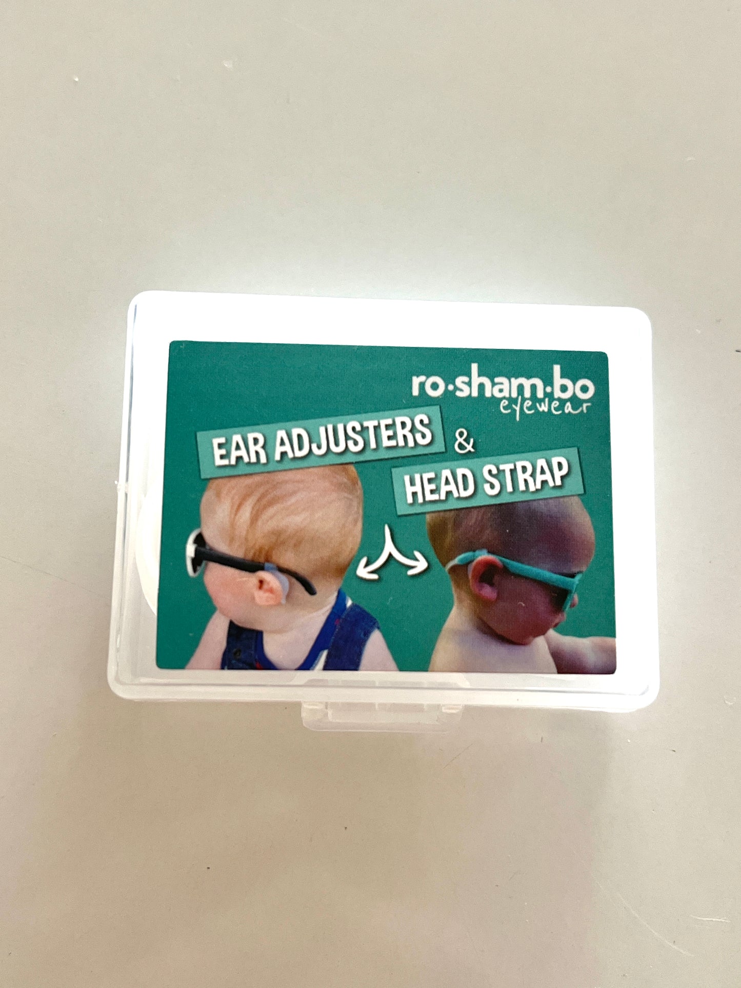 Hodestropp og ørejusterere